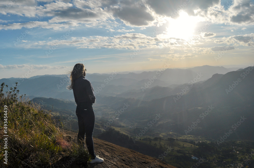 Fototapeta premium woman on mountain top