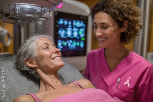 Mature Woman Receives Mammogram Exam with Smiling Technician in Hospital Setting for Health Checkup