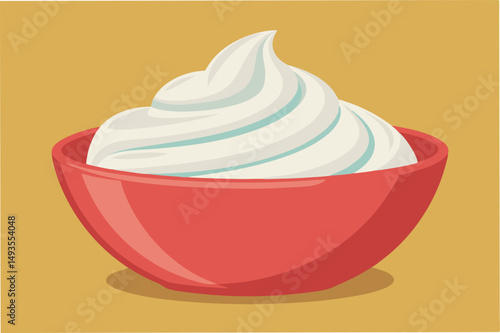 Creamy whipped topping in a red bowl on a teal background for dessert decoration or culinary presentation