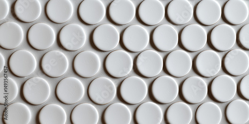 White ceramic penny tile texture with glossy finish and minimal grout lines.
