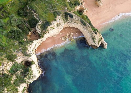 Aerial view of a stunning Algarve beach with golden sand and turquoise waters
