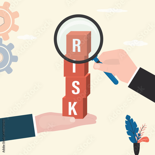 Analyze potential danger level. Hands with magnifying glass and cubes on stack with the word RISK. Risk management, control or assess to lose money in investing.