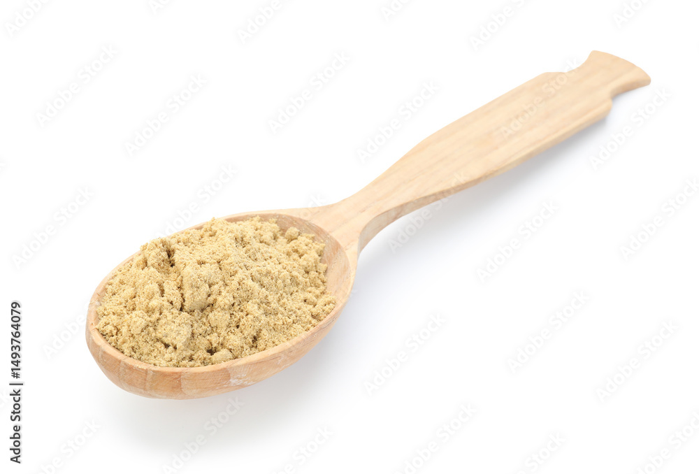 Dry ginger powder in wooden spoon isolated on white Dry ginger powder in wooden spoon isolated on white
