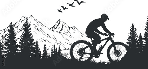 Silhouette of a cyclist riding a mountain bike through forested terrain with mountains and birds in background