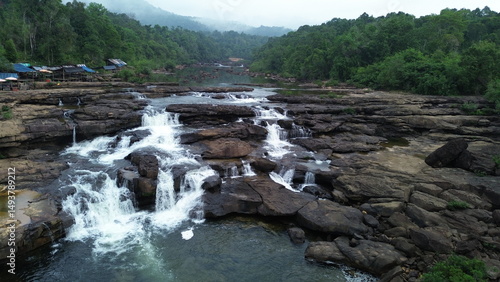 Aerial view of majestic Tatai Waterfall in Koh Kong Province surrounded by dense jungle, Cambodia