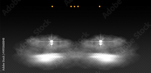 Bright light beams create a dramatic atmosphere with fog effects in a darkened space during a performance at night