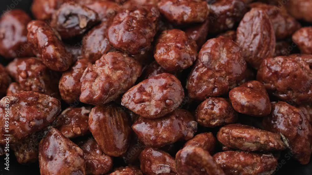 Caramelized almonds. Toasted almonds coated with caramel syrup. Caramelized almonds. Toasted almonds coated with caramel syrup.