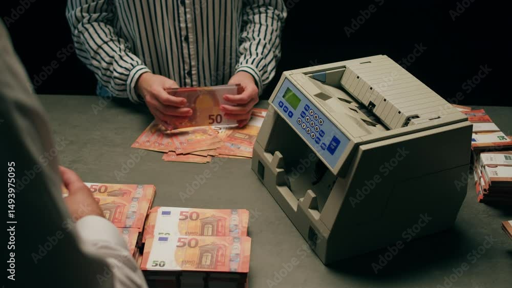 Banknotes and bag counter, Specialised police officer Counting dollar euro banknotes in crime lab with machine, cashed out criminal money, bitcoin changing, buying home flat in bank. 