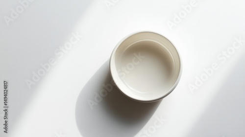 Empty Bowl Amidst Light and Shadow
