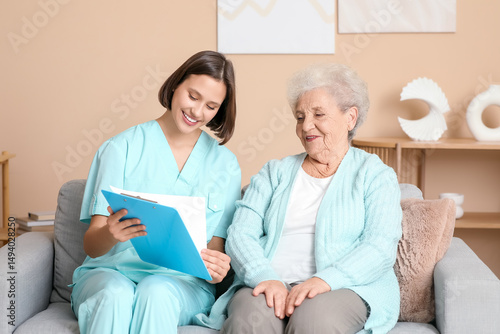 Smiling nurse discussing me...