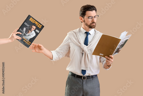 Handsome businessman taking...