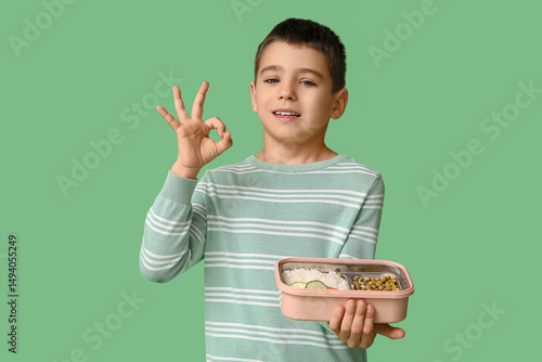 Little boy with lunchbox sh...