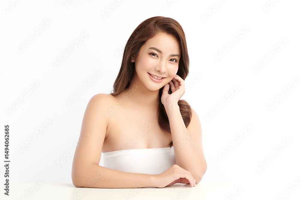 A beautiful young Asian woman with clean, fresh skin against a white background. Skincare, facial treatment, cosmetology, beauty, and spa. An elegant portrait of an Asian woman. A beautiful young Asian woman with clean, fresh skin against a white background. Skincare, facial treatment, cosmetology, beauty, and spa. An elegant portrait of an Asian woman.