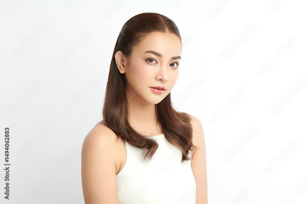 A beautiful young Asian woman with clean, fresh skin against a white background. Skincare, facial treatment, cosmetology, beauty, and spa. An elegant portrait of an Asian woman. A beautiful young Asian woman with clean, fresh skin against a white background. Skincare, facial treatment, cosmetology, beauty, and spa. An elegant portrait of an Asian woman.