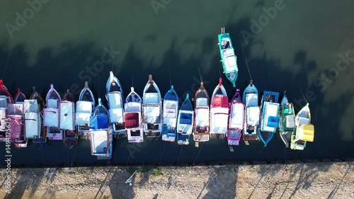 Vibrant boats lined up at Paraty harbor, showcasing the charm of Rio de Janeiro's coastal beauty.