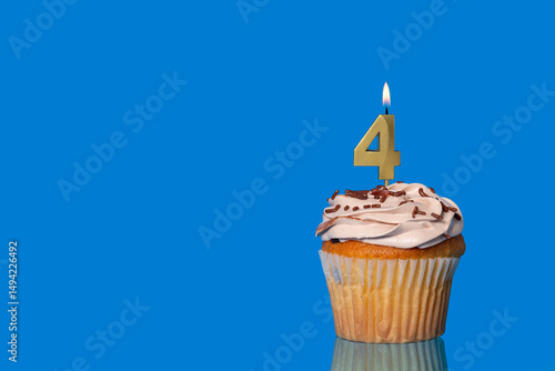 Birthday Or Anniversary Cupcake with Lit Candle; Number 4 Candle.