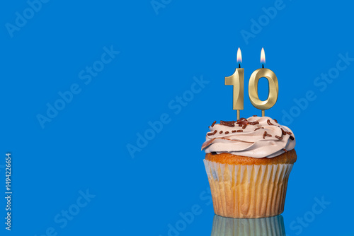 Birthday Or Anniversary Cupcake with Lit Candle; Number 10 Candle.