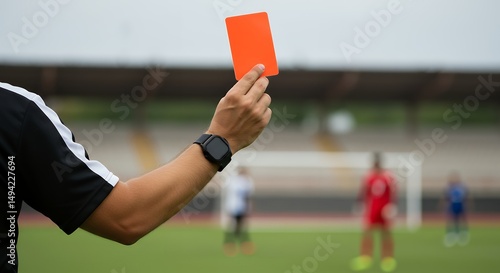 Referee Showing Red Card at Soccer Match