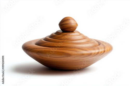 Handmade spinning top toy made of wood isolated on white background