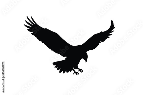 Silhouette of an eagle with wings spread wide and talons extended, appearing to descend in flight on a clean white background in dramatic form.