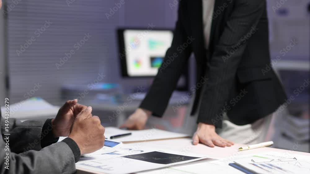 Businesswoman shaking hands with businessman in office meeting. Business partners shaking hands at the end of a successful meeting in a modern office, expressing satisfaction and agreement. Businesswoman shaking hands with businessman in office meeting. Business partners shaking hands at the end of a successful meeting in a modern office, expressing satisfaction and agreement.