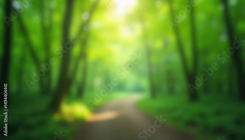 Blured sunlight filters through lush green trees along a winding path, evoking tranquility and