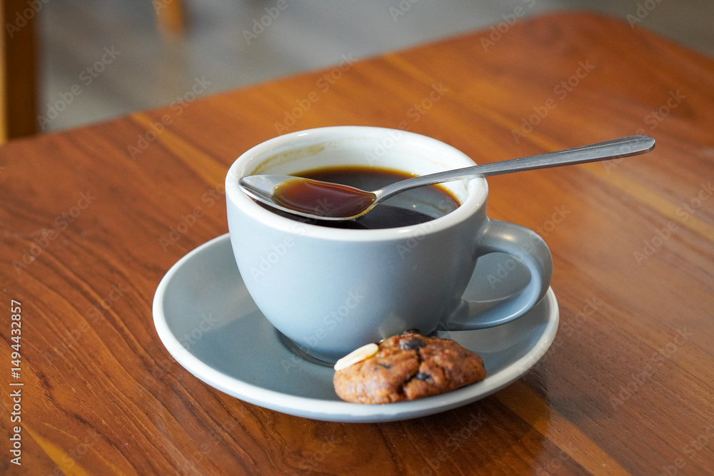 Obraz premium Hot Americano, captured on May 20, 2025. A smooth and bold espresso-based coffee with hot water, offering a clean, rich flavor and deep aroma