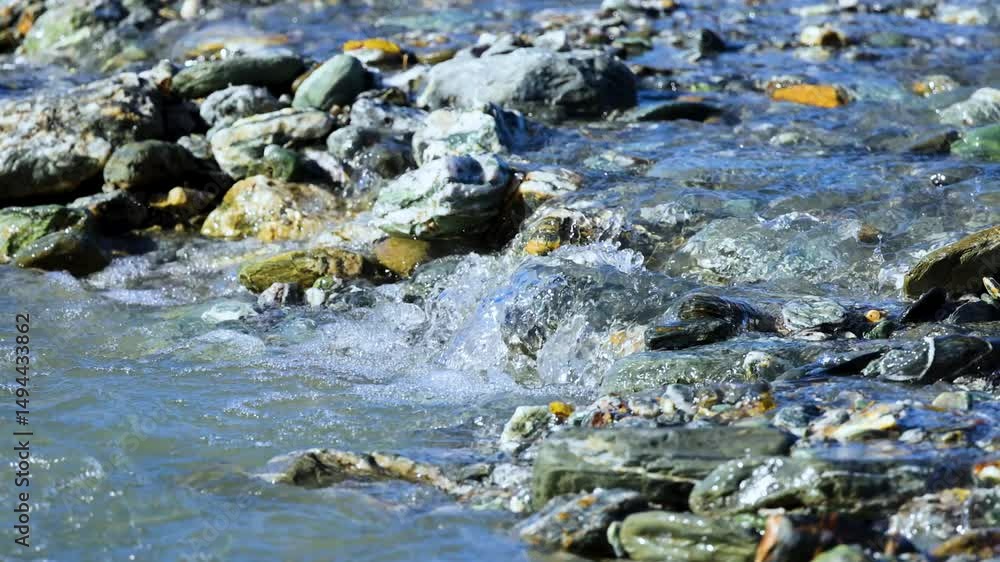 Flowing Stream Over Rocks in New Zealand Flowing Stream Over Rocks in New Zealand