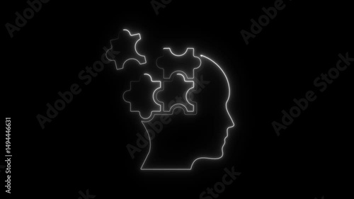 Cognitive process concept with human head silhouette and puzzle pieces illuminated on black background
