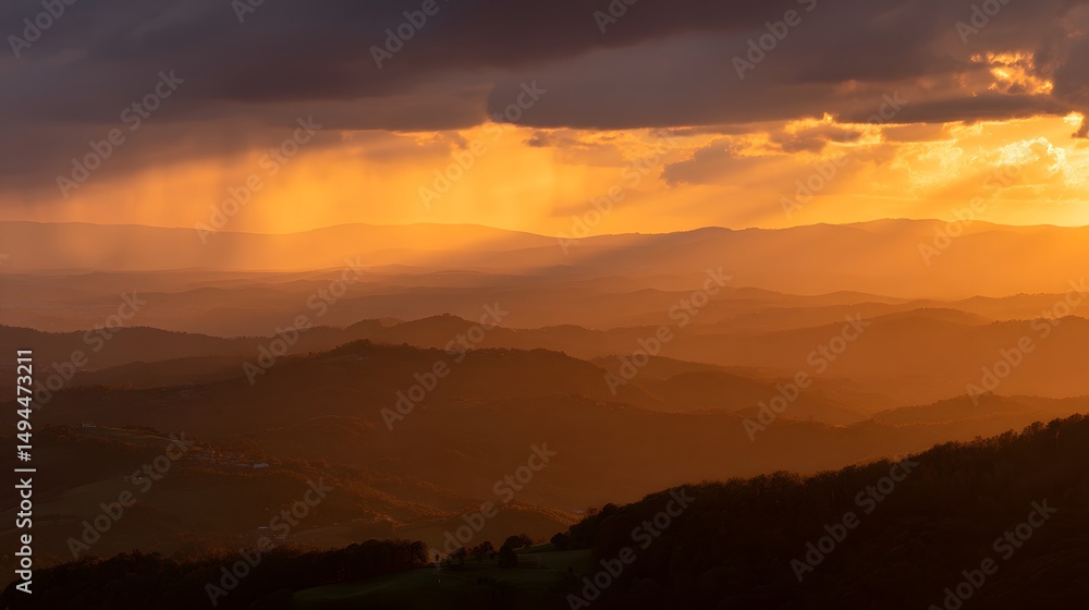 Fototapeta premium Panoramic sunset landscape with golden light streaming through dramatic clouds and blending into soft orange and purple hues under a tranquil evening sky
