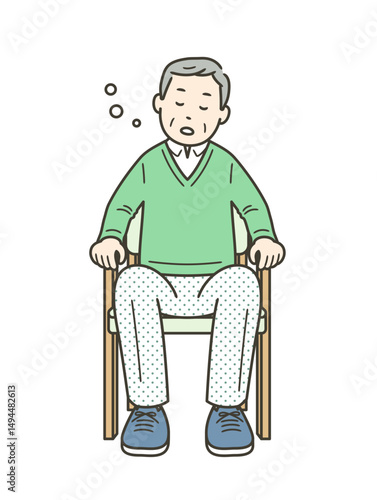 椅子に座って居眠りをする高齢男性
