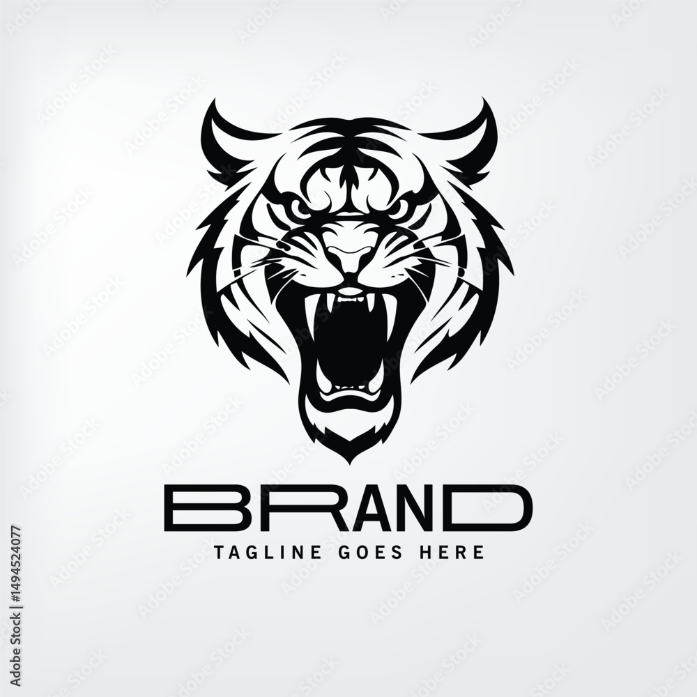 Fototapeta premium Tiger head logo design with brand name and tagline space. Bold graphic of a roaring tiger head presented in black and white against a light gray background.