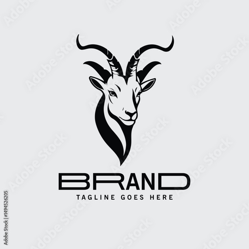 Black and white stylized goat head logo design with a modern brand name and tagline. Abstract graphic of a goat head viewed from the front with detailed horns and flowing mane.