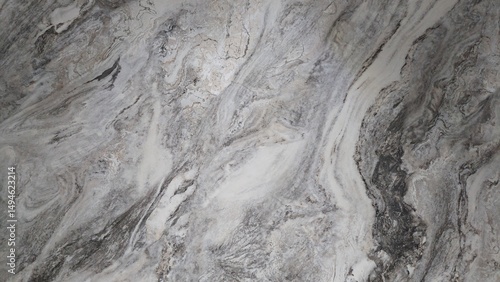Close-up of a marble surface with patterns, ideal for use as a background, texture, or design element in architecture and interior decor.