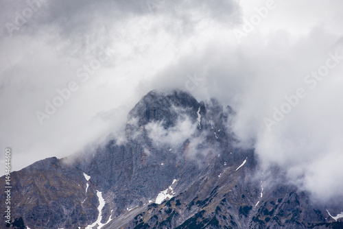 Hexenturm mountain peak in clouds, Austrian Alps
