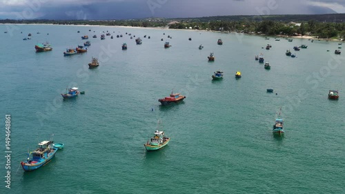 Binh Thuan, Vietnam May 18, 2025 4k Aerial video of  boats on Binh thuan coast near Ke Ga Lighthouse 