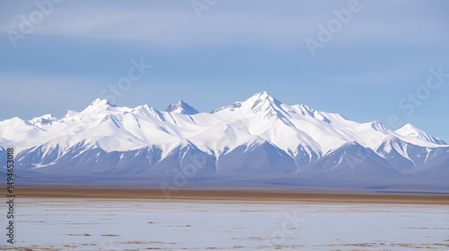 Alaskan mountain range behind sparse sageland