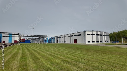  lifting a large part with a crane at a factory