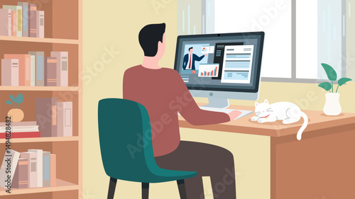 A man works from home, participating in a video conference on his computer, with a cat resting on his desk.