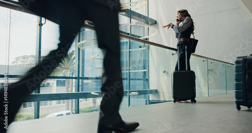 Fotografía Business trip, employee and woman with suitcase, phone call and communication for travel arrangement