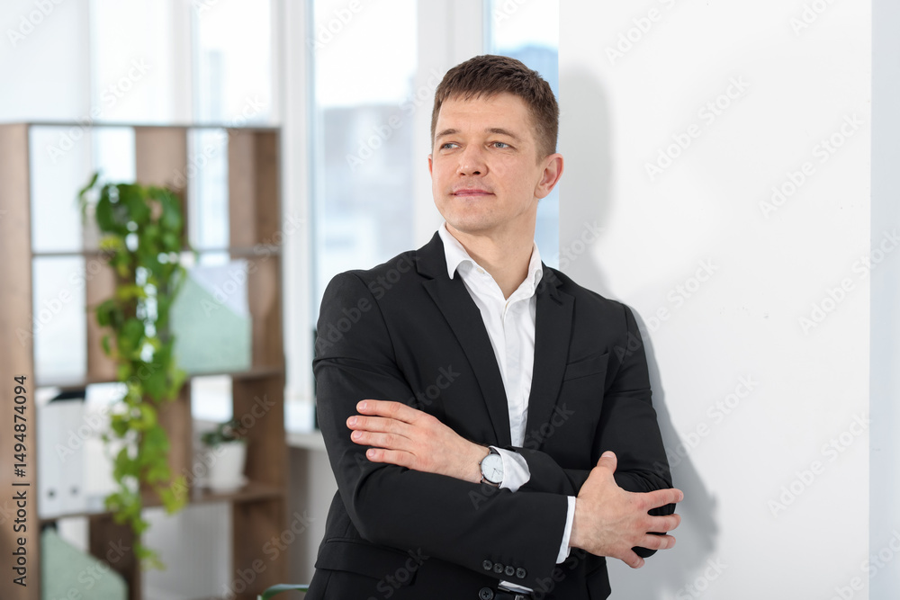 Fototapeta premium Portrait of handsome middle aged man indoors