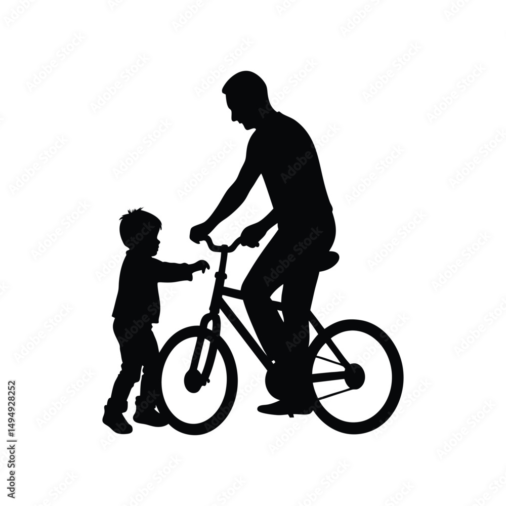 Fototapeta premium Father and Son Silhouette Learning to Ride a Bike