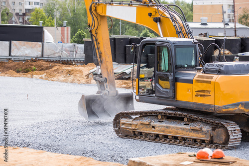 Fotografie An excavator on a construction site in close-up