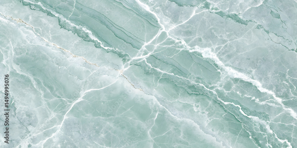 Fototapeta premium Seafoam green marble with subtle diagonal veining. White streaks and occasional gold accents traverse the stone, showcasing natural geological formations across the polished surface