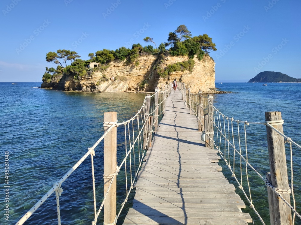 Wooden bridge to Cameo island, Zakynthos, Greece. Cameo islet is called wedding island. Ionian sea.