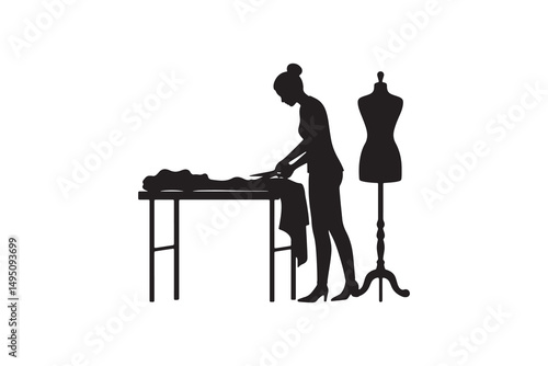 Fashion Designer Silhouette at Work Table - Seamstress Cutting Cloth Silhouette