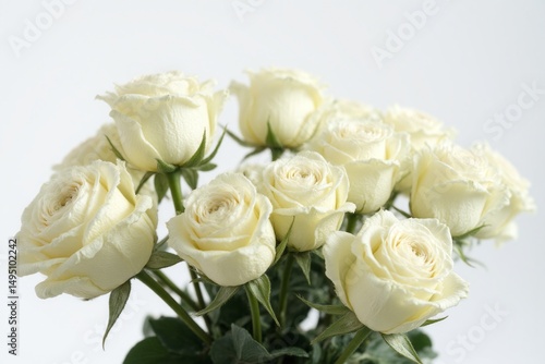 bouquet of white roses in a vase on a table