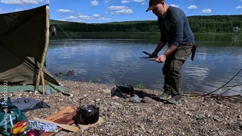 Cooking food over a fire outdoors