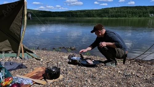Cooking food over a fire outdoors