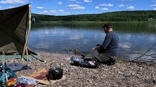 Cooking food over a fire outdoors